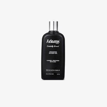 Black bottle of Adams shower gel for men on a white background